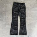 ITAMI WAX DENIM SLIM FLARE — front flat-lay on concrete